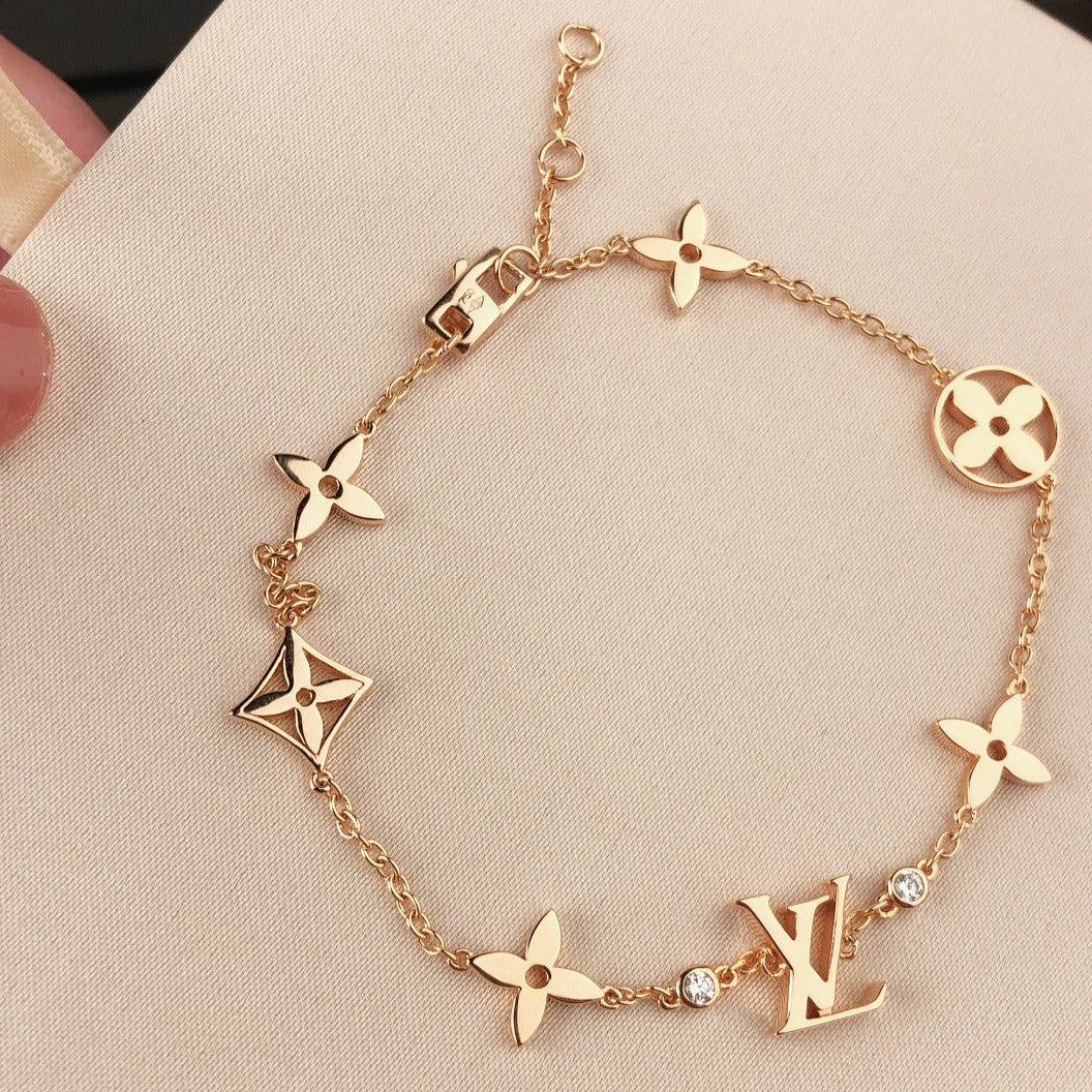 [LUXE]STAR AND SUN 7 MOTIFS GOLD BRACELET